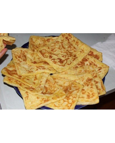 Msamen | DULCES MARROQUÍS | Embárcate en un viaje culinario exquisito con nuestro dulce marroquí Msaman. Cada capa de esta de...